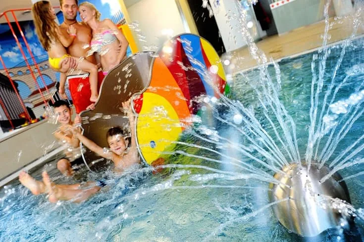 Indoor pool with kids playing