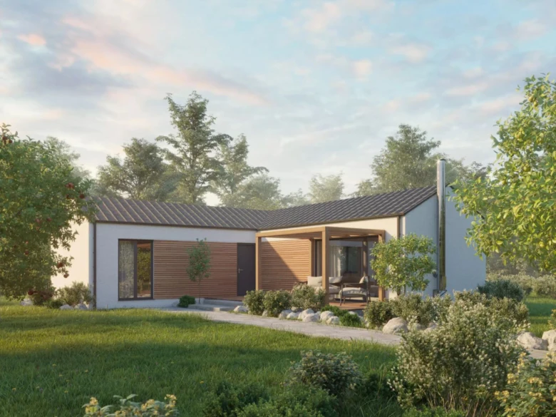 Moderní bungalov ve tvaru L s dřevěným obkladem v zelené krajině.