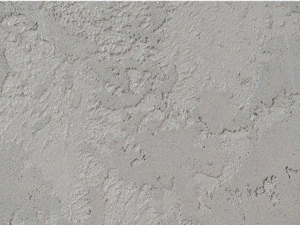 Textura betonové stěrky na vnitřní zeď s viditelnými stopami špachtle.