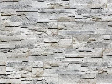 Kamenný obklad pro krb z žáruvzdorného materiálu.