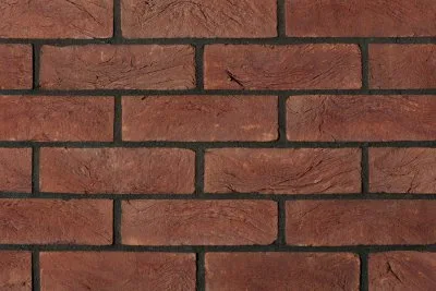 Červené cihlový obklad pro krb žáruvzdorného materiálu.