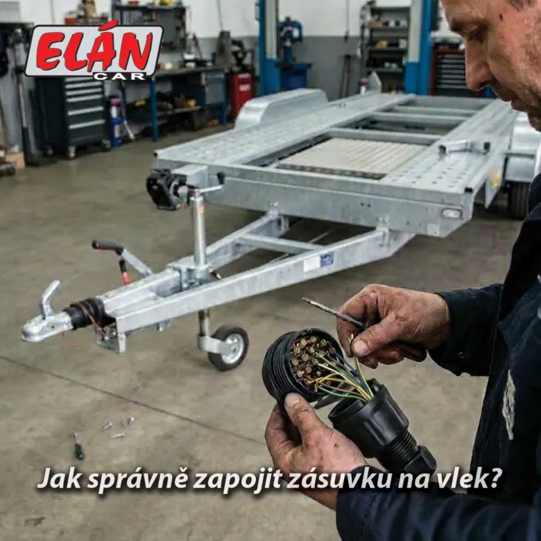 Muž opravuje elektrickou zásuvku pro přívěs v dílně.