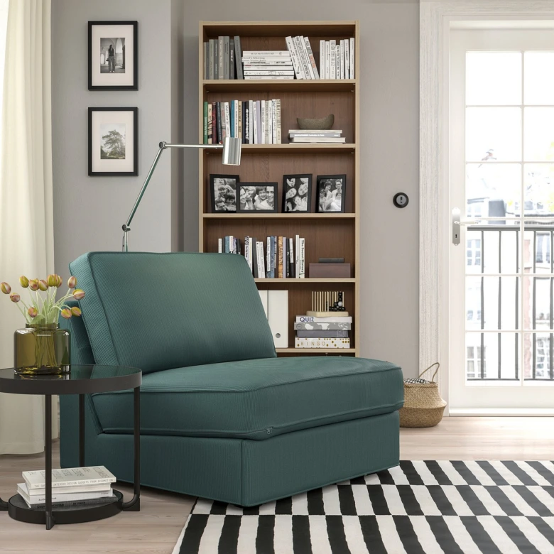 Teal recliner chair with storage base